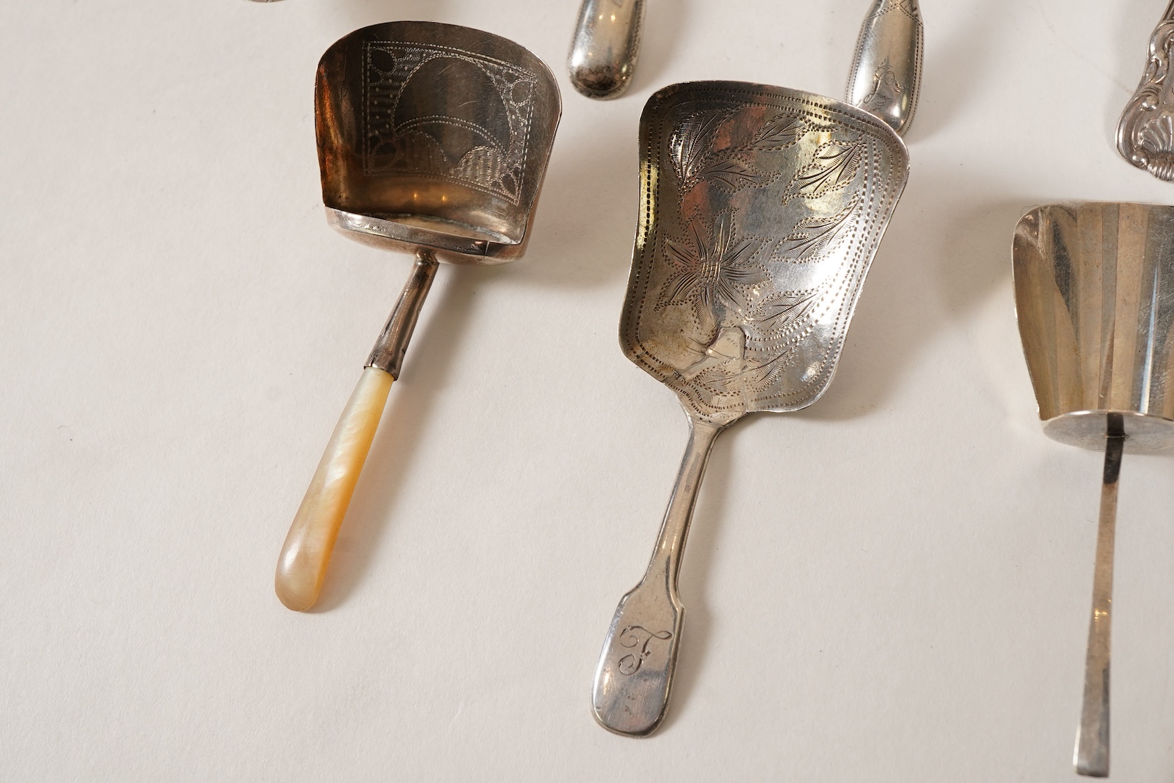 Ten assorted mainly 19th century silver caddy spoons, most with shovel bowls